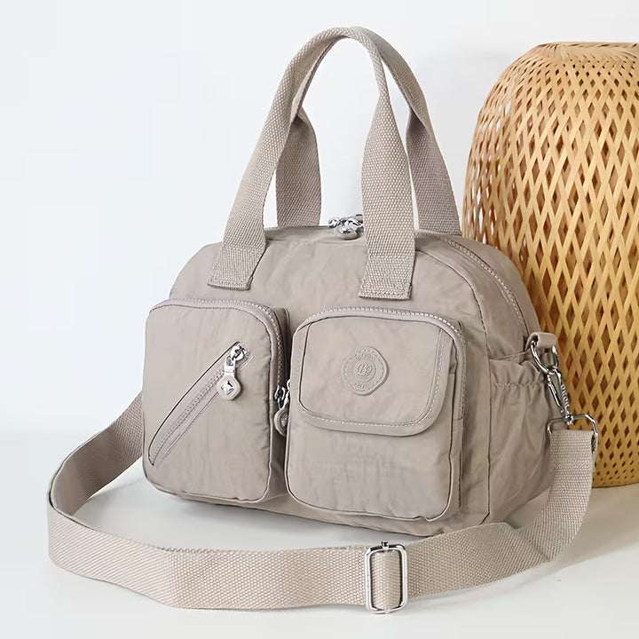 VALENTINA MULTI-POCKET CROSSBODY BAG