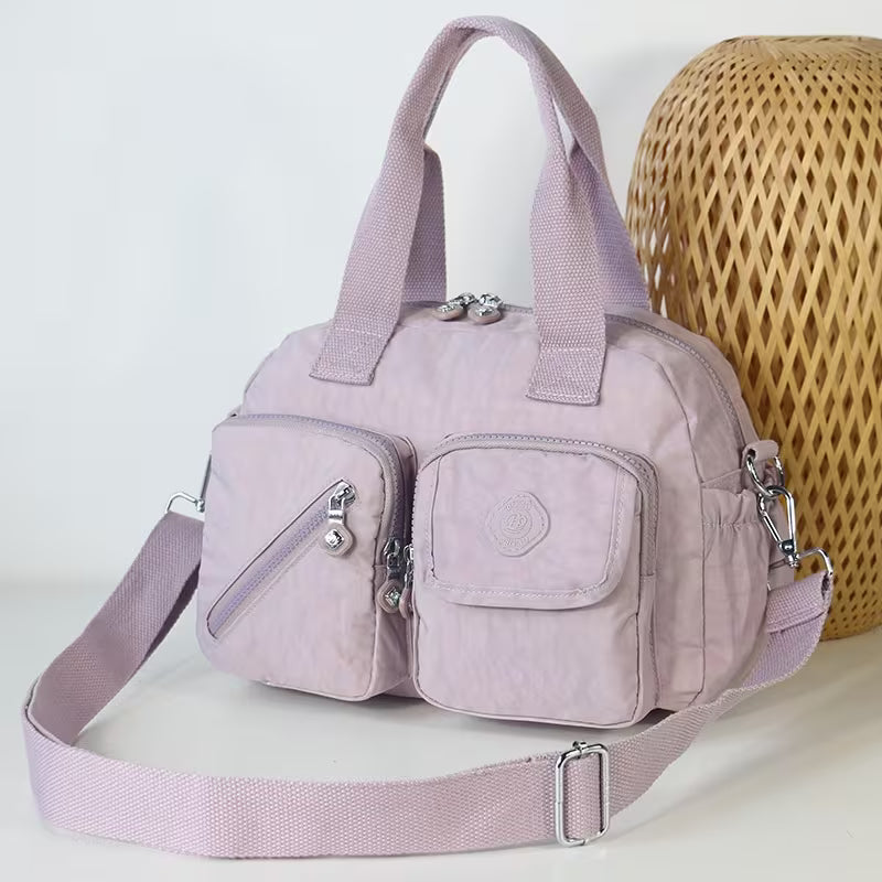 VALENTINA MULTI-POCKET CROSSBODY BAG