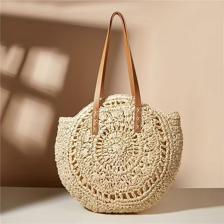 FELICIA HOLLOW ROUND STRAW BAG