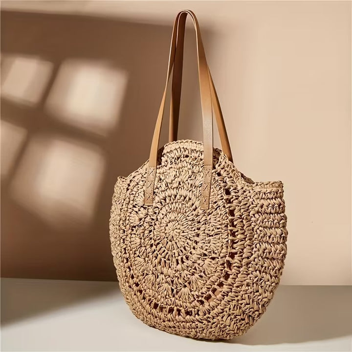 FELICIA HOLLOW ROUND STRAW BAG