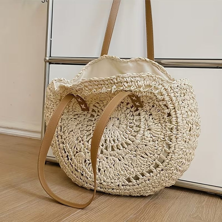 FELICIA HOLLOW ROUND STRAW BAG
